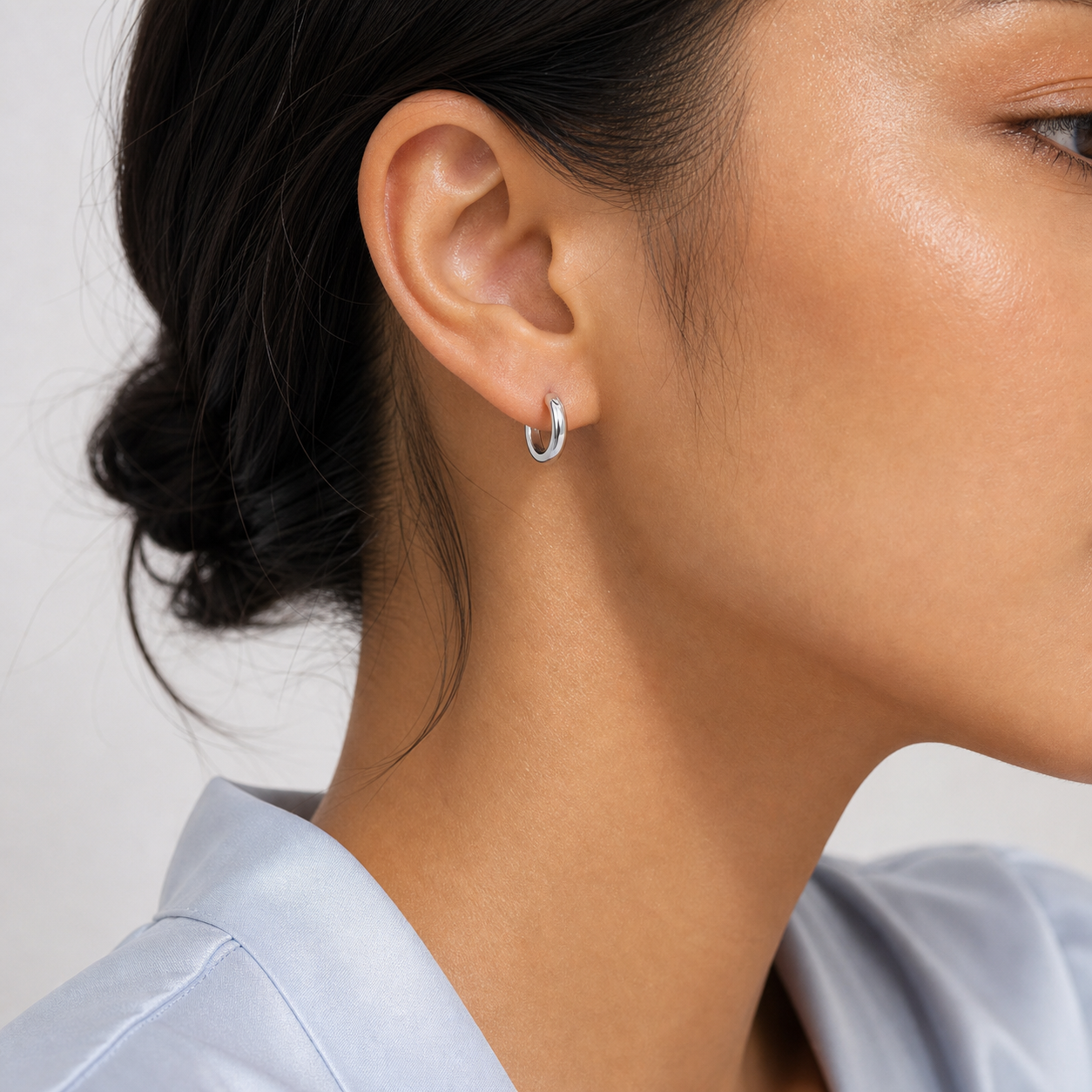 Solene Tiny Huggie Hoop Earrings model silver by SURI