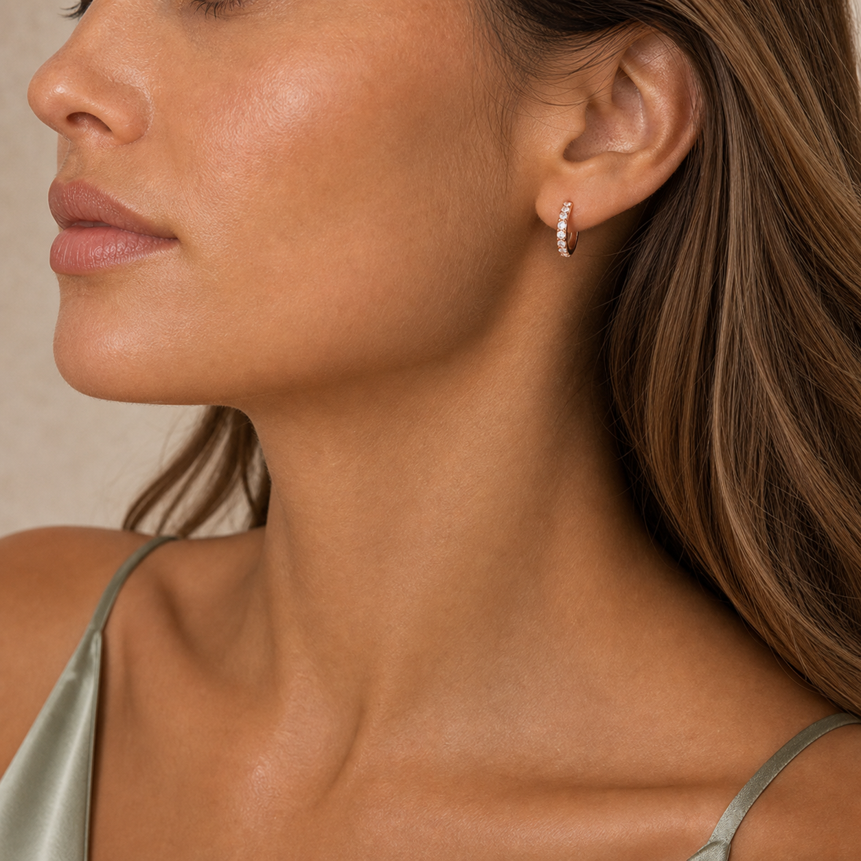 Lucia Pave Huggie Hoop Earrings model rose by SURI