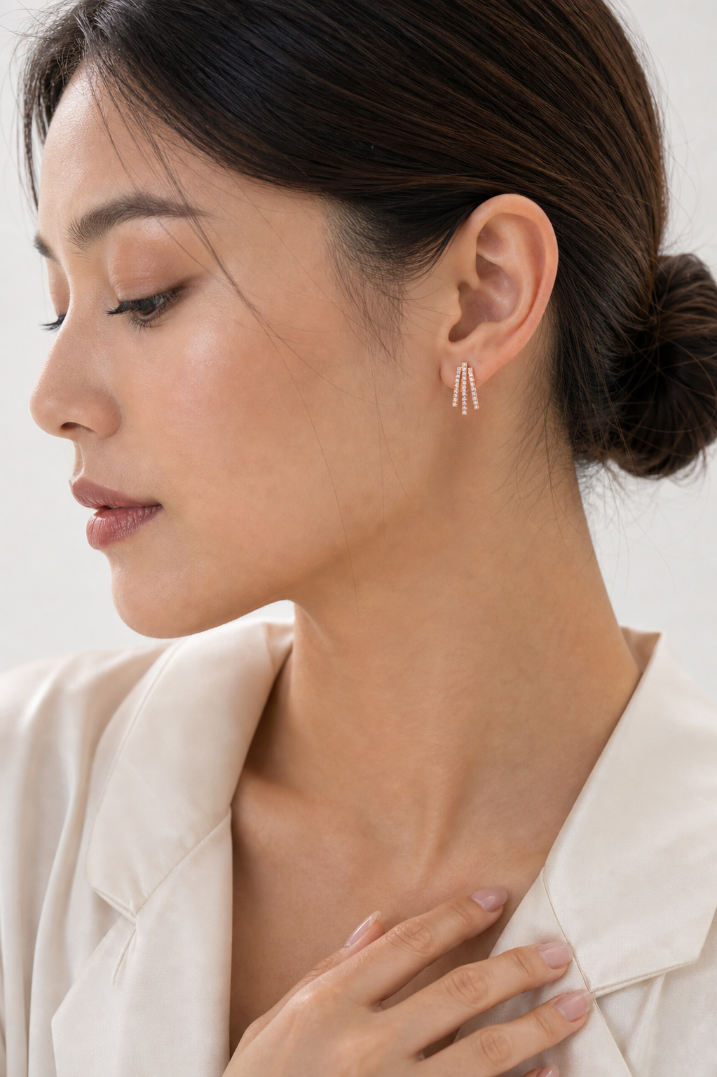 Three Pave Graduated Wrap Earrings model rose gold asian by SURI