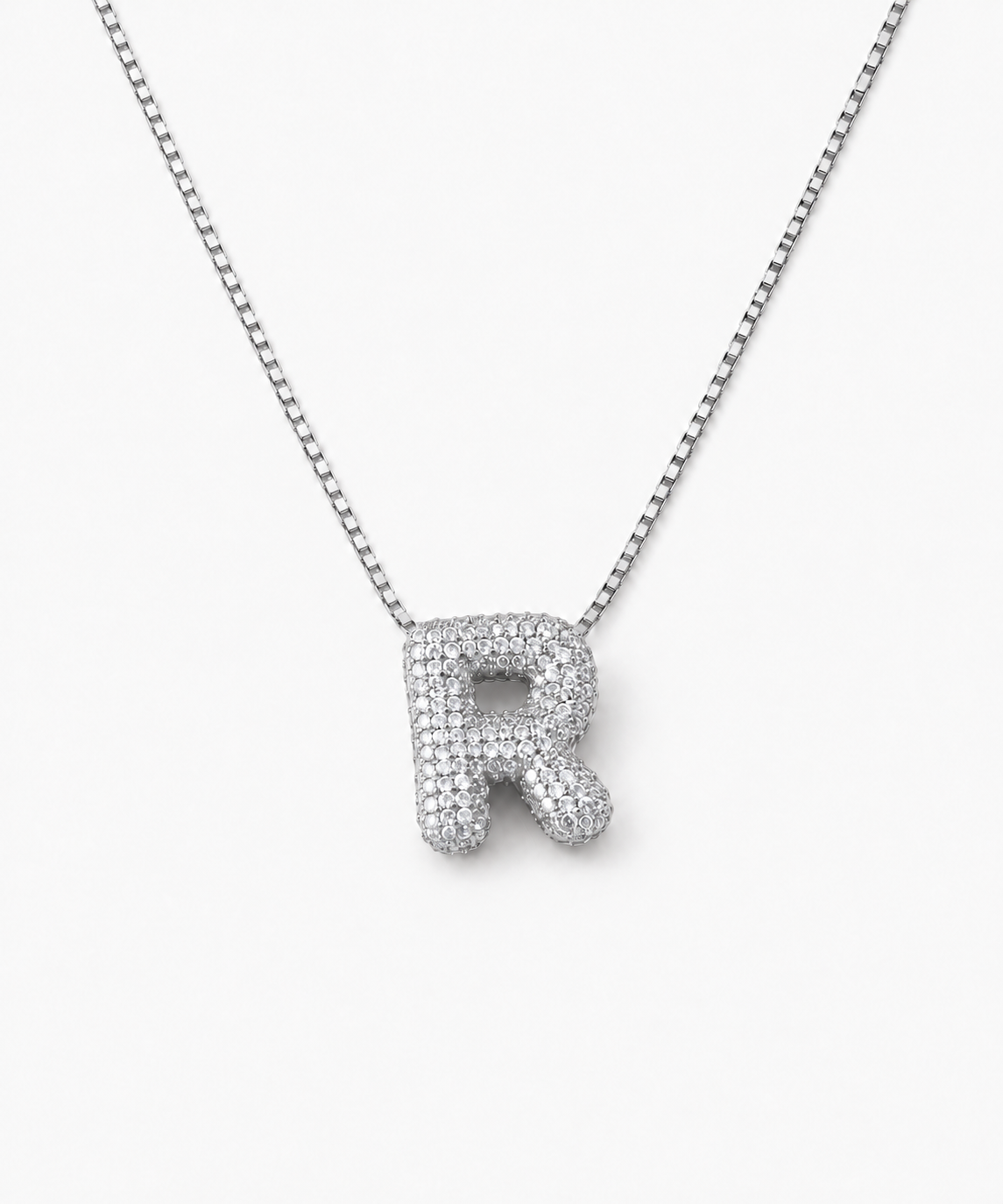 Inori Pavé Initial Necklace — silver on white/gray background