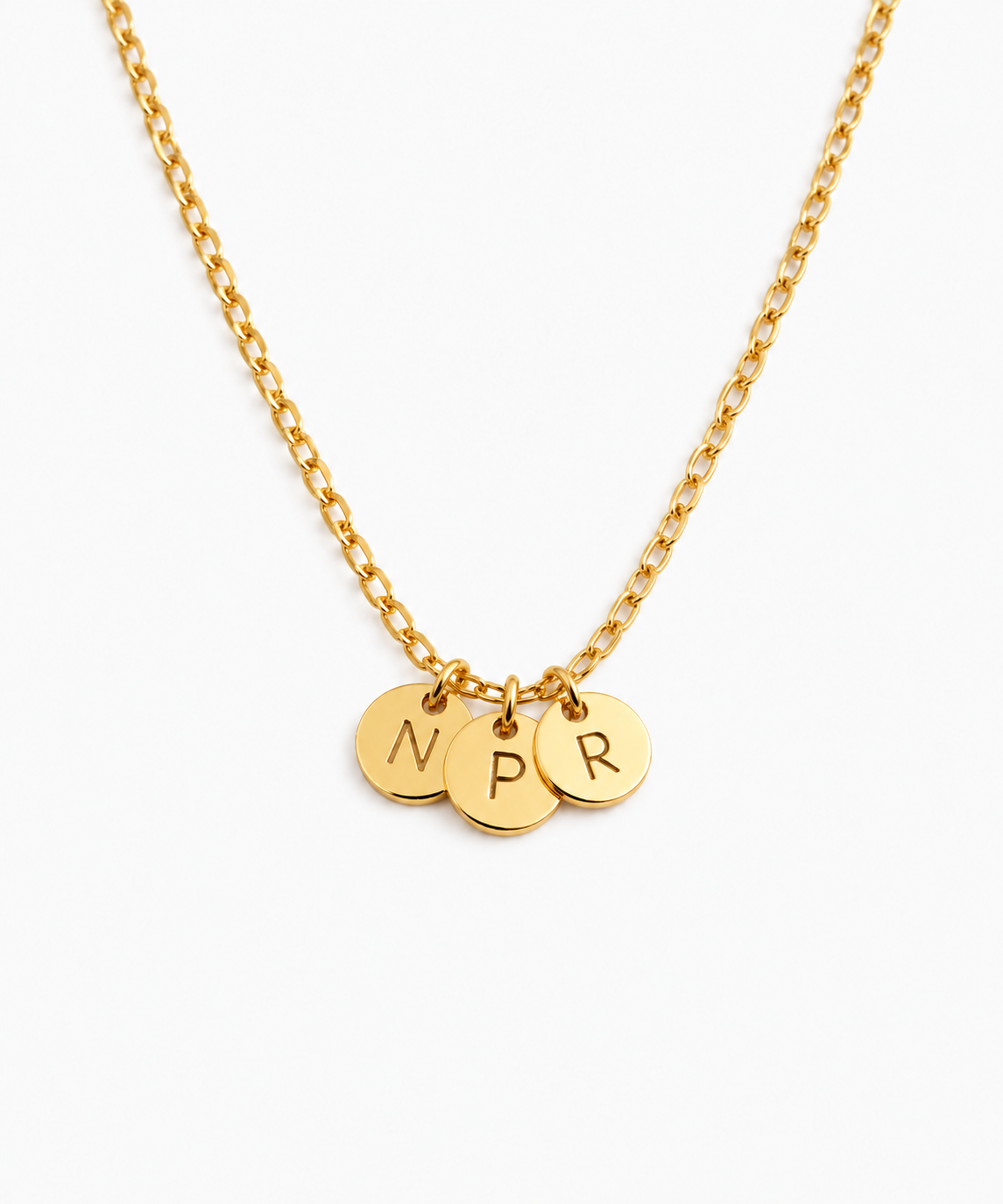 Vela Engravable Initial Disc Necklace — gold finish on white background