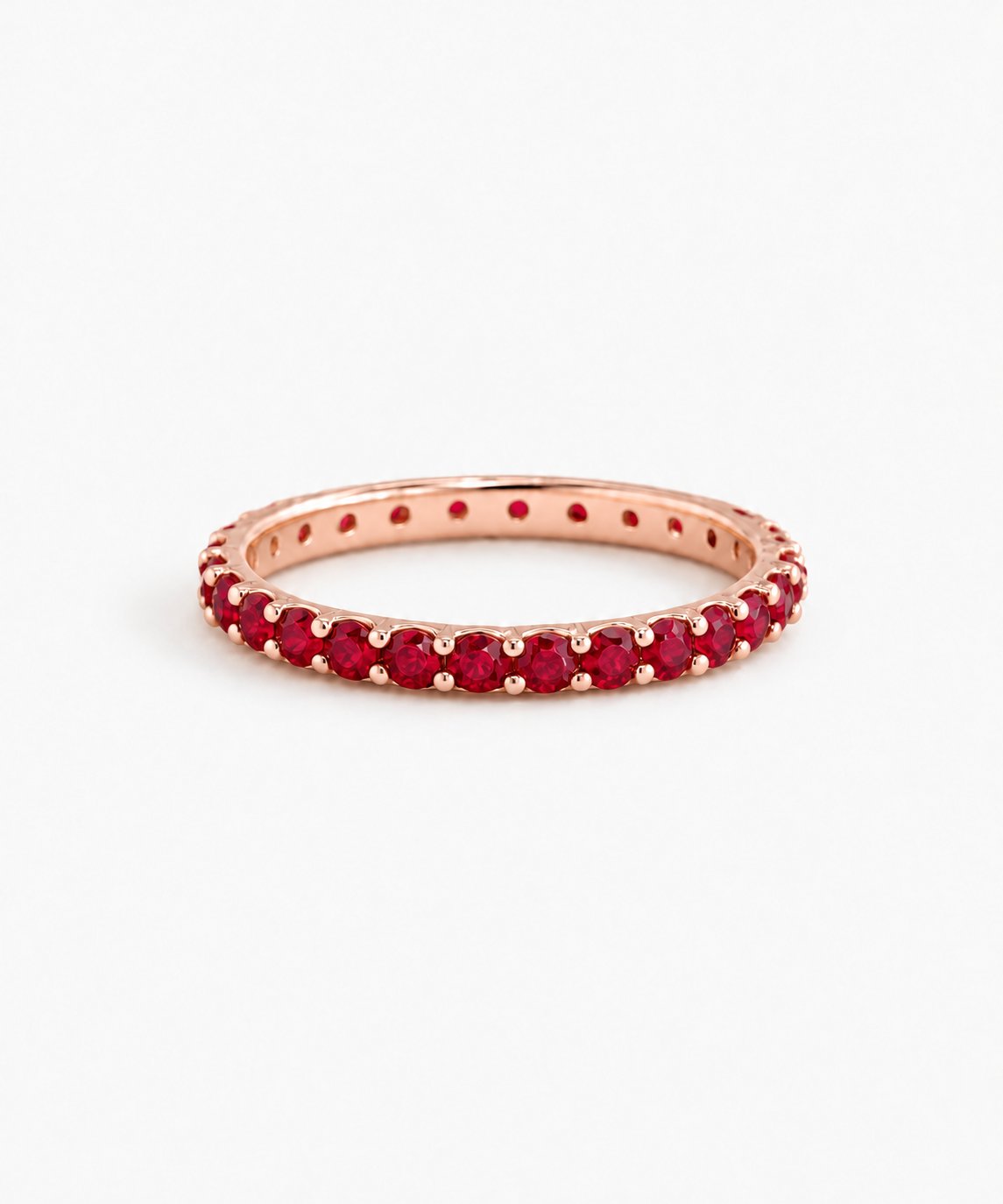 Sakura Ruby Tennis Ring — rose gold finish on white background