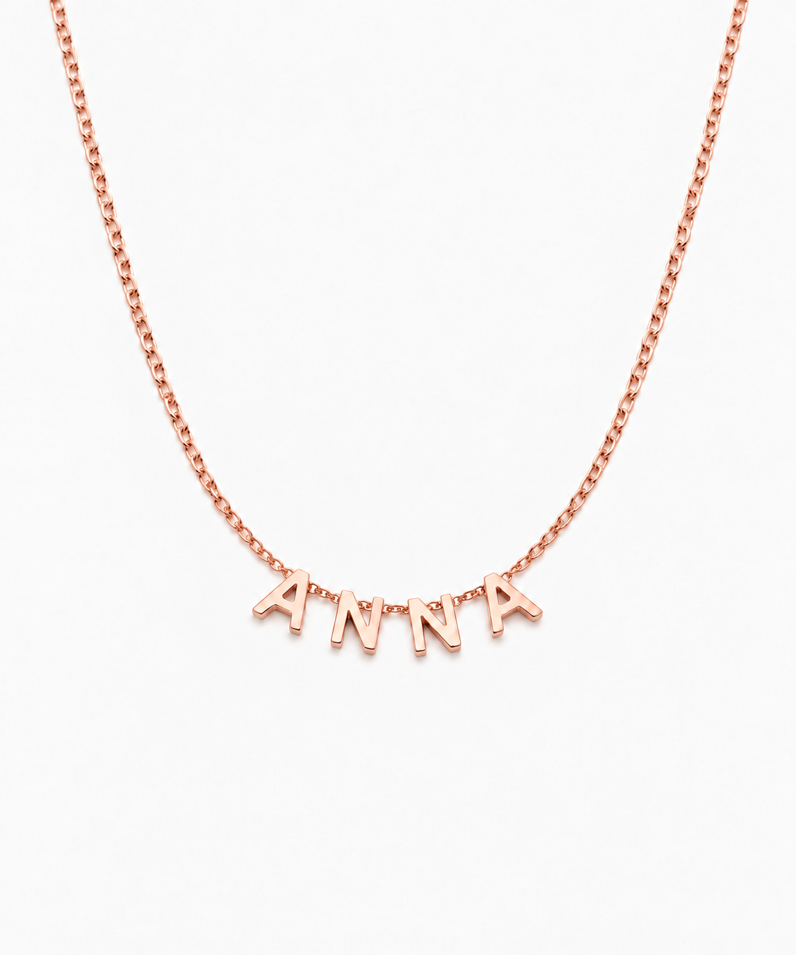 Ava Letter Necklace in rose gold on white background