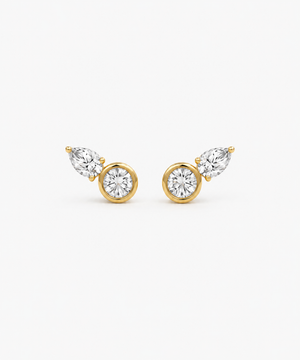 Coria Bezel Stud Earrings in gold on white background