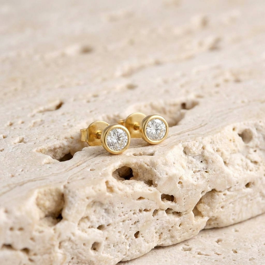 Hana Bezel Stud Earrings layering detail by SURI