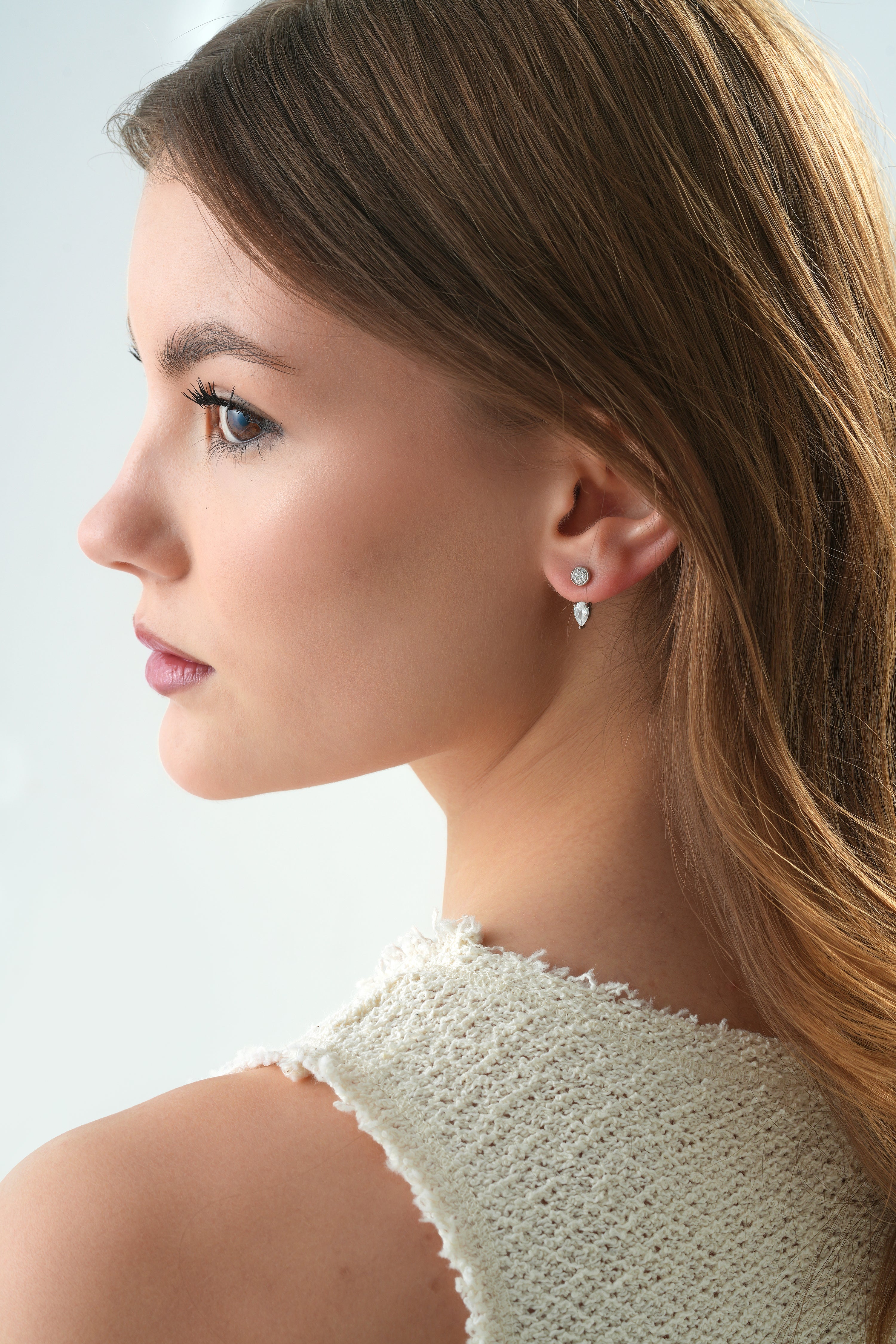 Macao Pear Drop Earrings layering detail by SURI