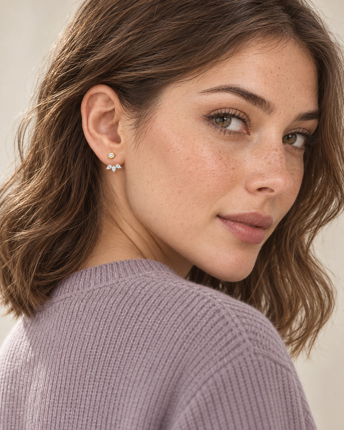 Model wearing Amara Marquise Jacket Earrings in gold
