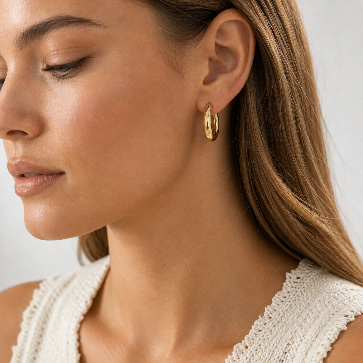 Parma Domed Hoop Earrings model 01 by SURI