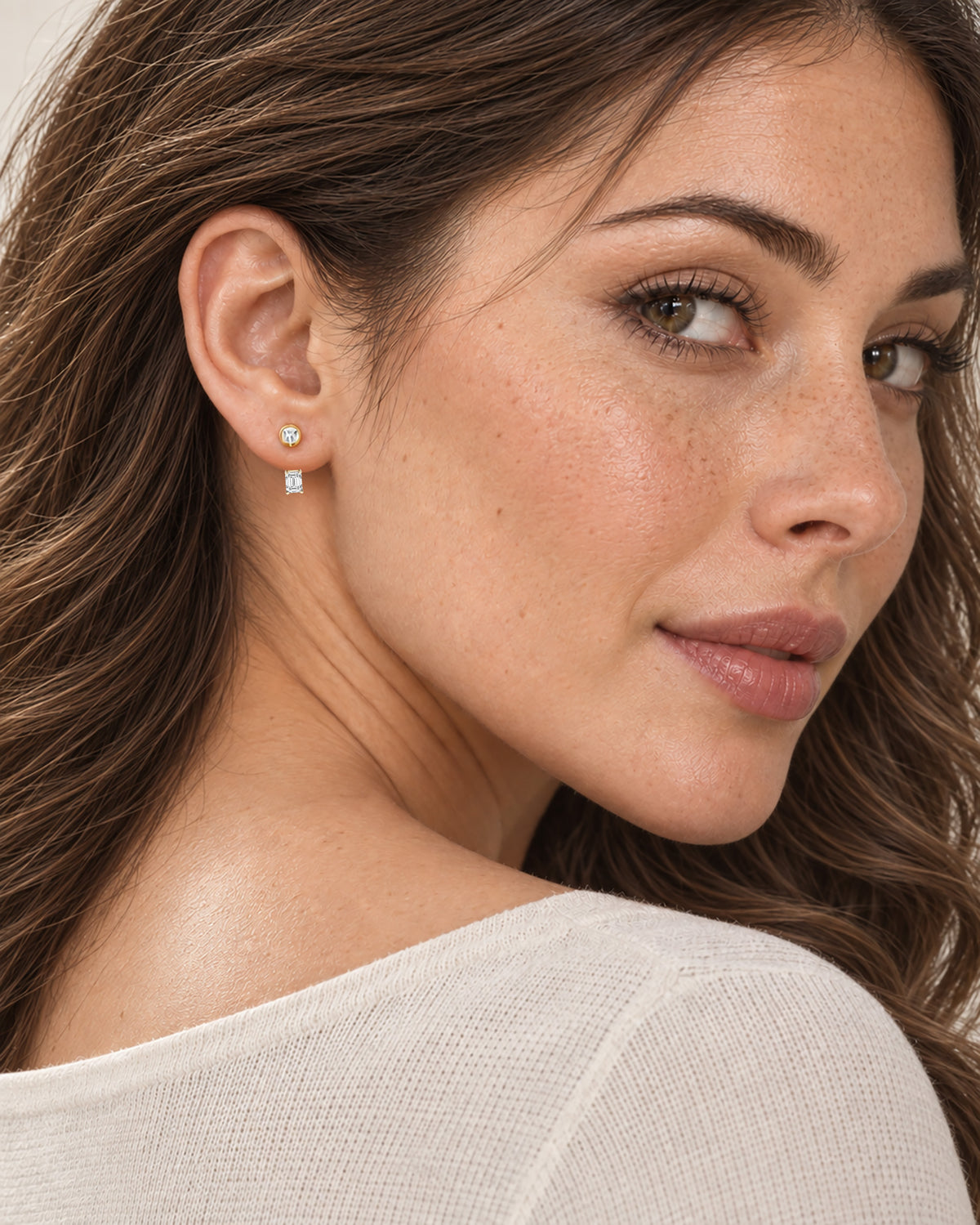 Clara Emerald-Cut Jacket Earrings in gold, worn on model
