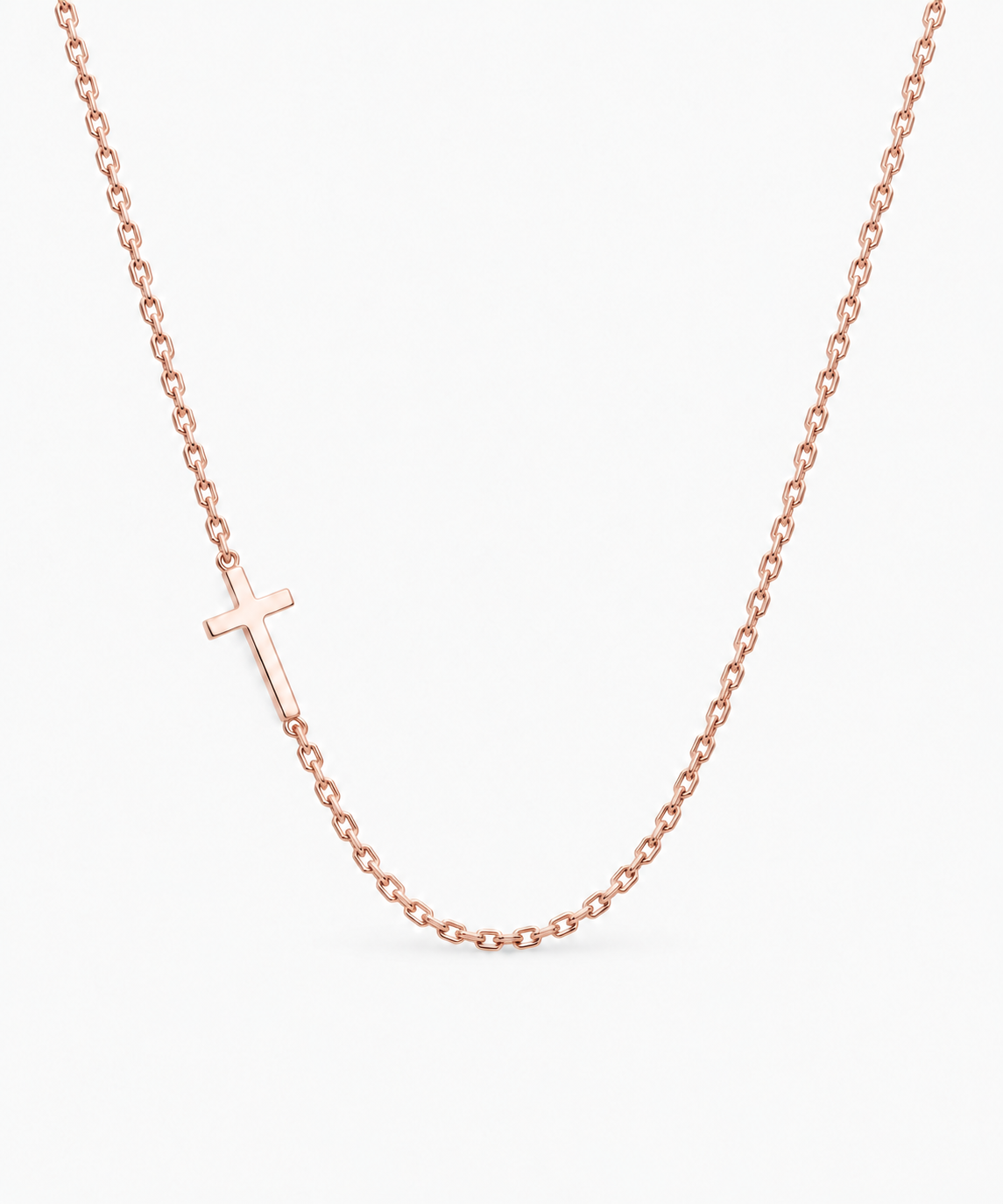 Estelle Sideways Cross Necklace — rose gold on white/gray background
