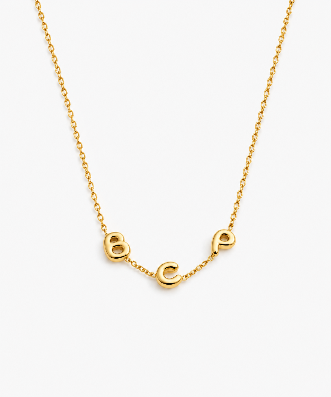 Sia Bubble Letter Necklace — Yellow Gold on white background