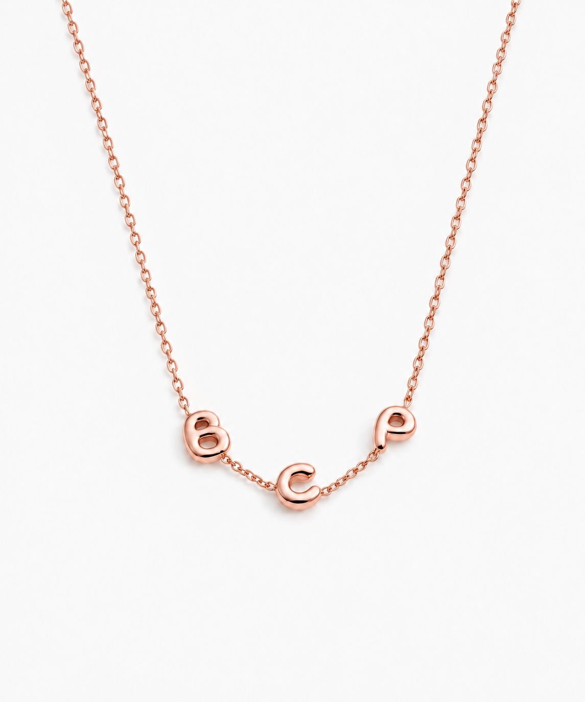 Sia Bubble Letter Necklace — Rose Gold on white background