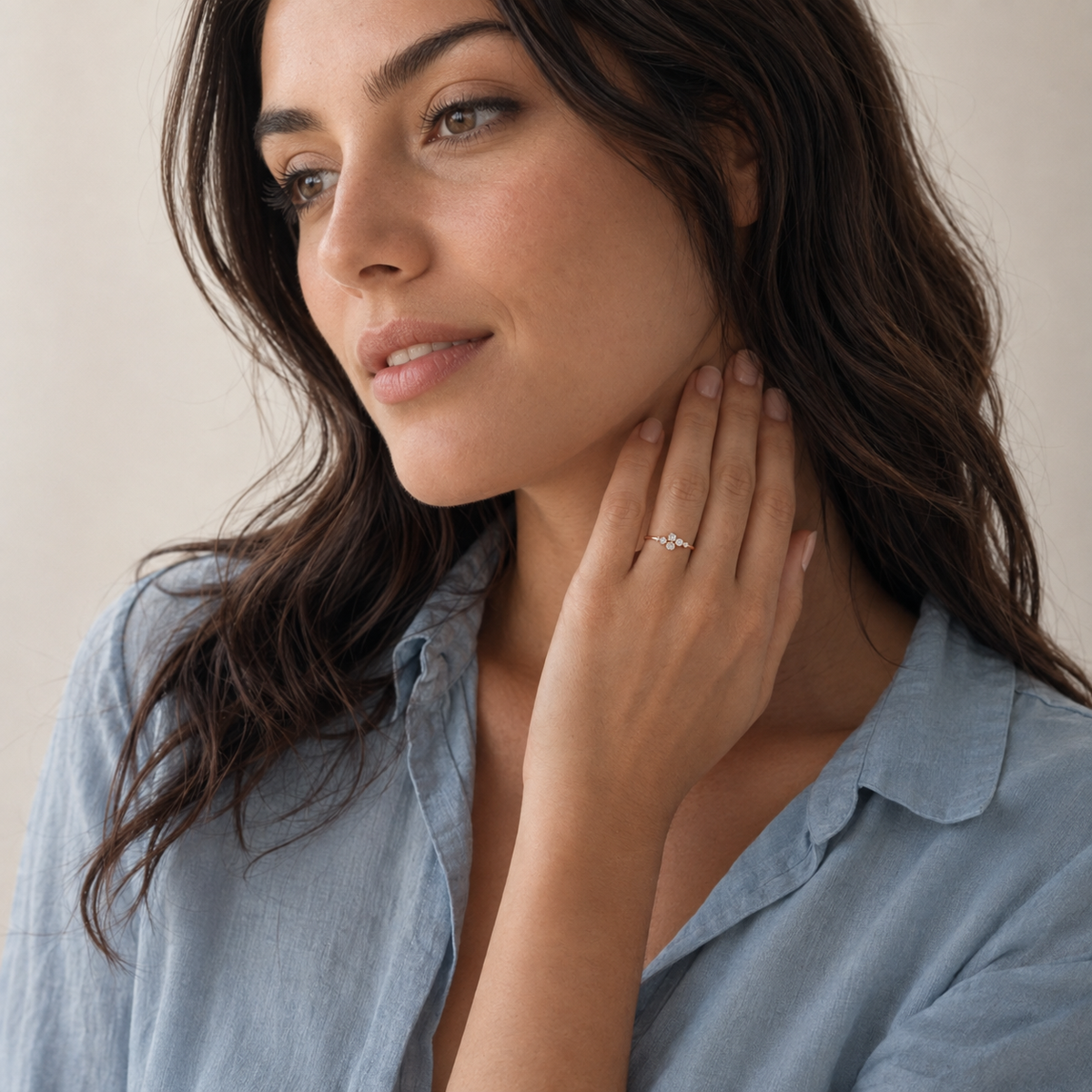 Elara Bezel Cluster Ring in rose gold on model