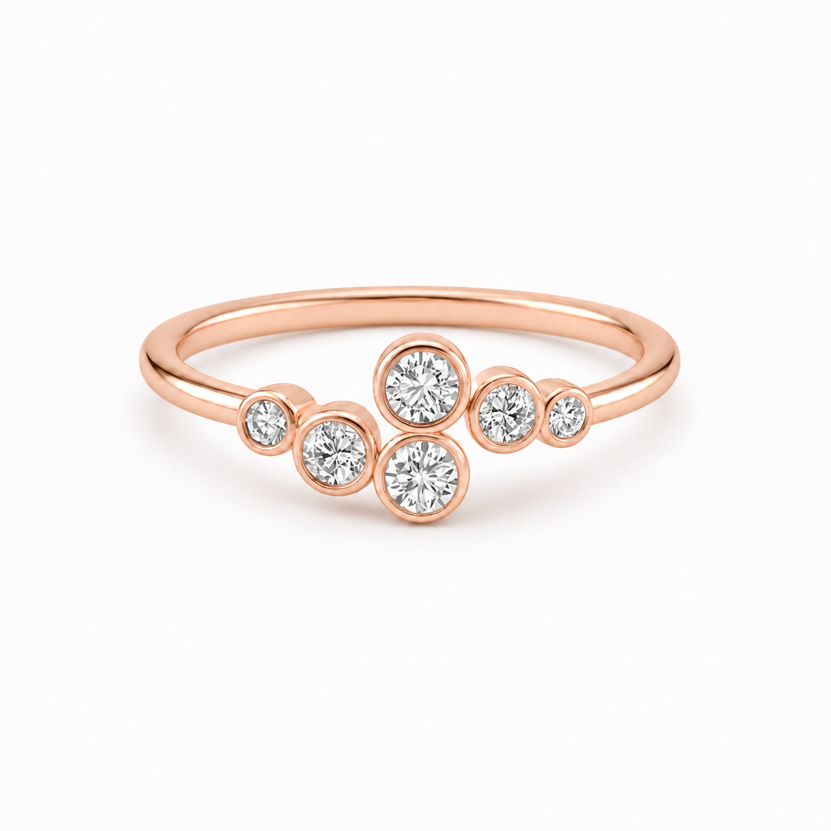 Elara Bezel Cluster Ring in rose gold on white background