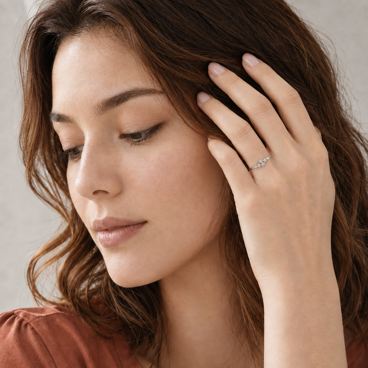 Elara Bezel Cluster Ring in silver on model