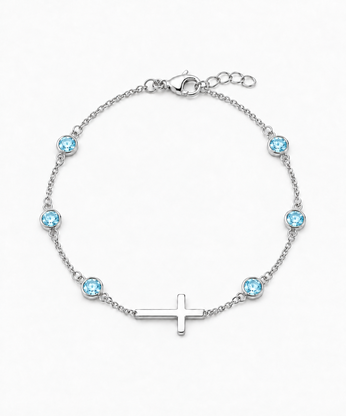 Marina Aquamarine Blue Birthstone Cross Bracelet — Silver / White Gold on white background