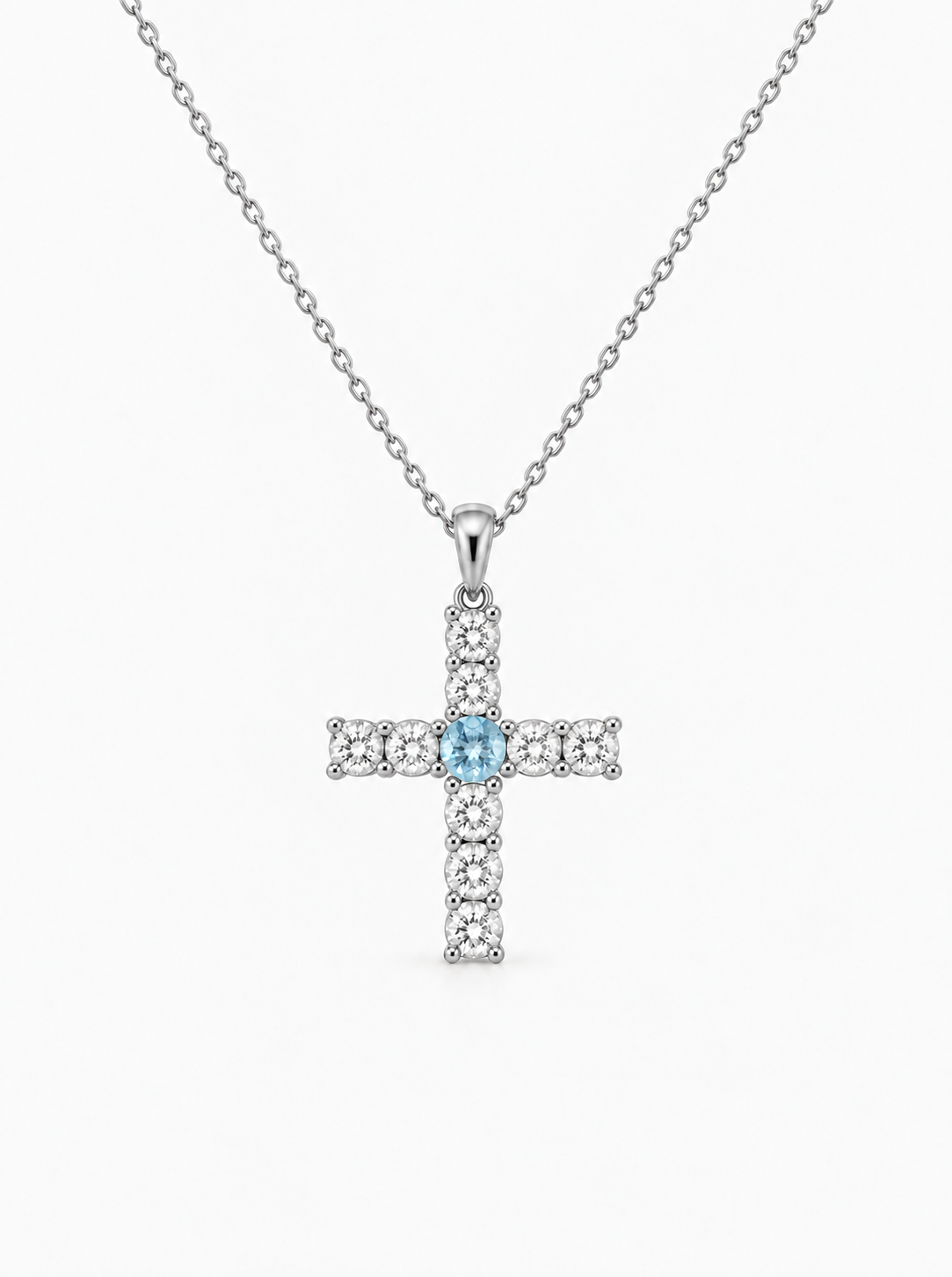 Evangelina Cross Birthstone Pendant Necklace — silver finish on white background