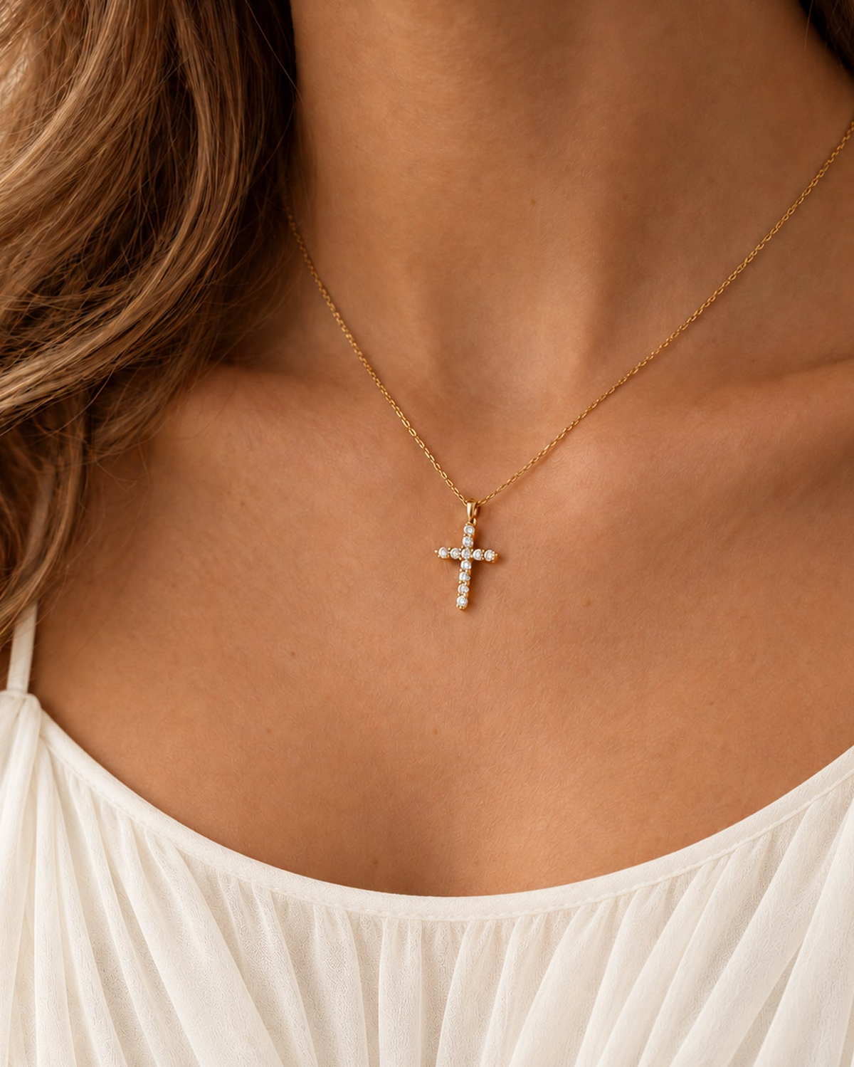 Solène Pavé Cross Necklace in gold worn on model — front view
