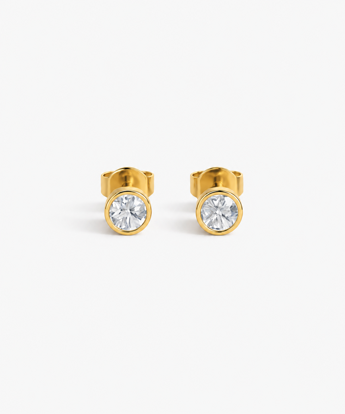 Hana Bezel Stud Earrings in gold on white background
