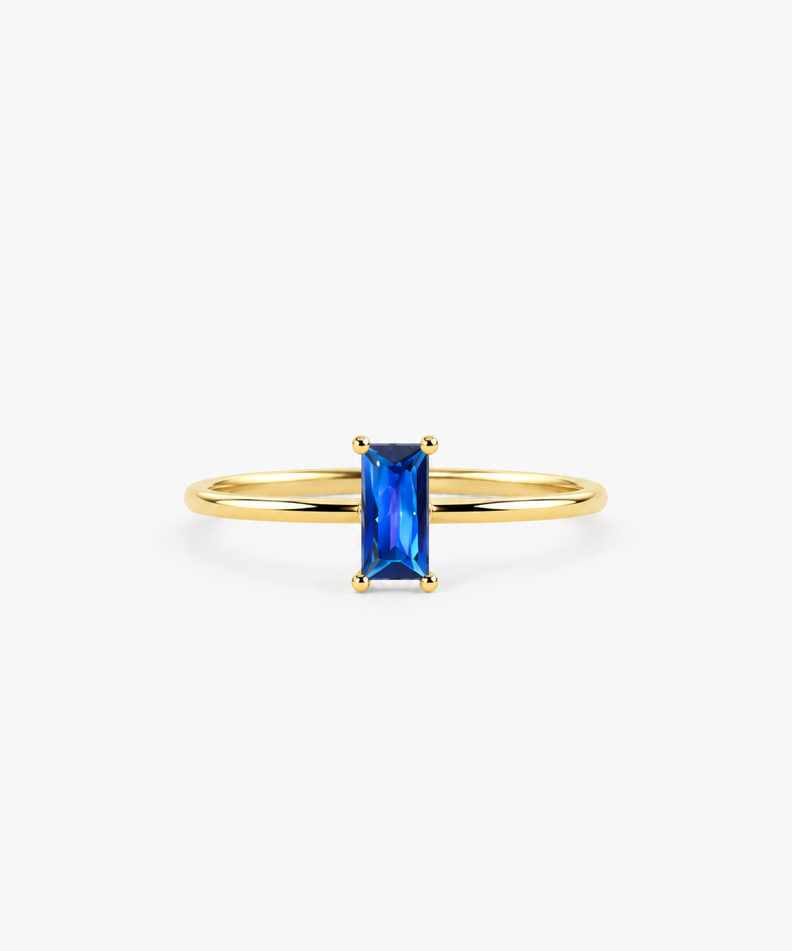 León Baguette Sapphire Ring in gold on white background