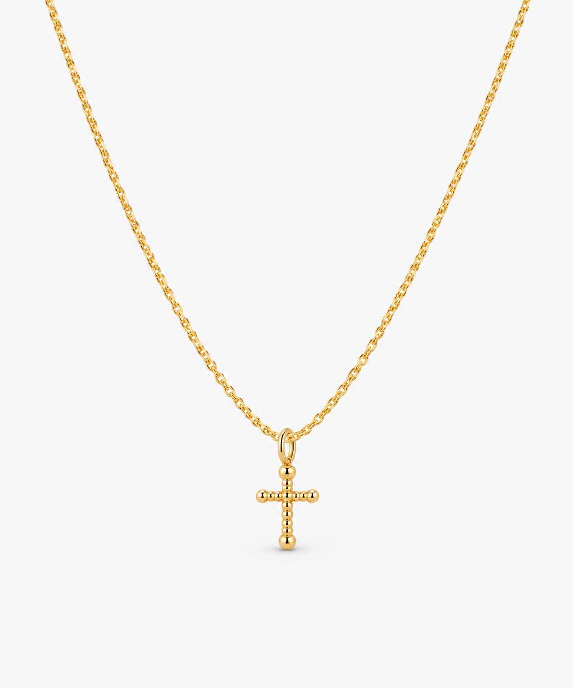 Elysia Cross Necklace in gold on white background