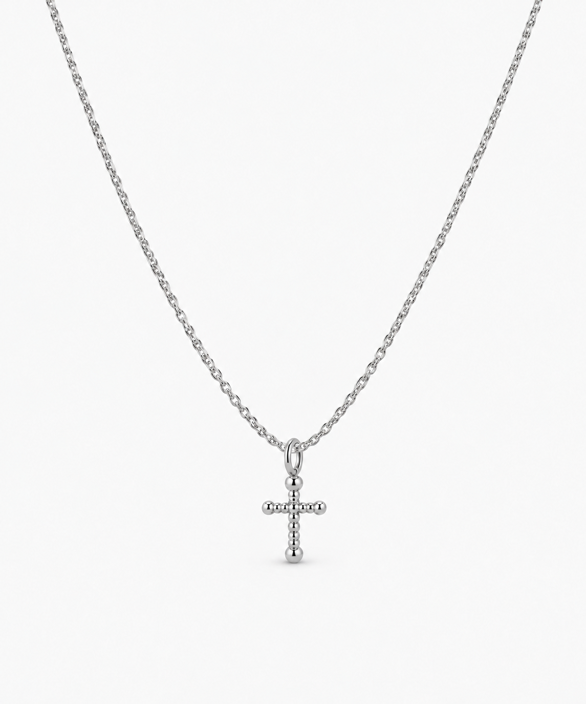 Elysia Cross Necklace in silver on white background