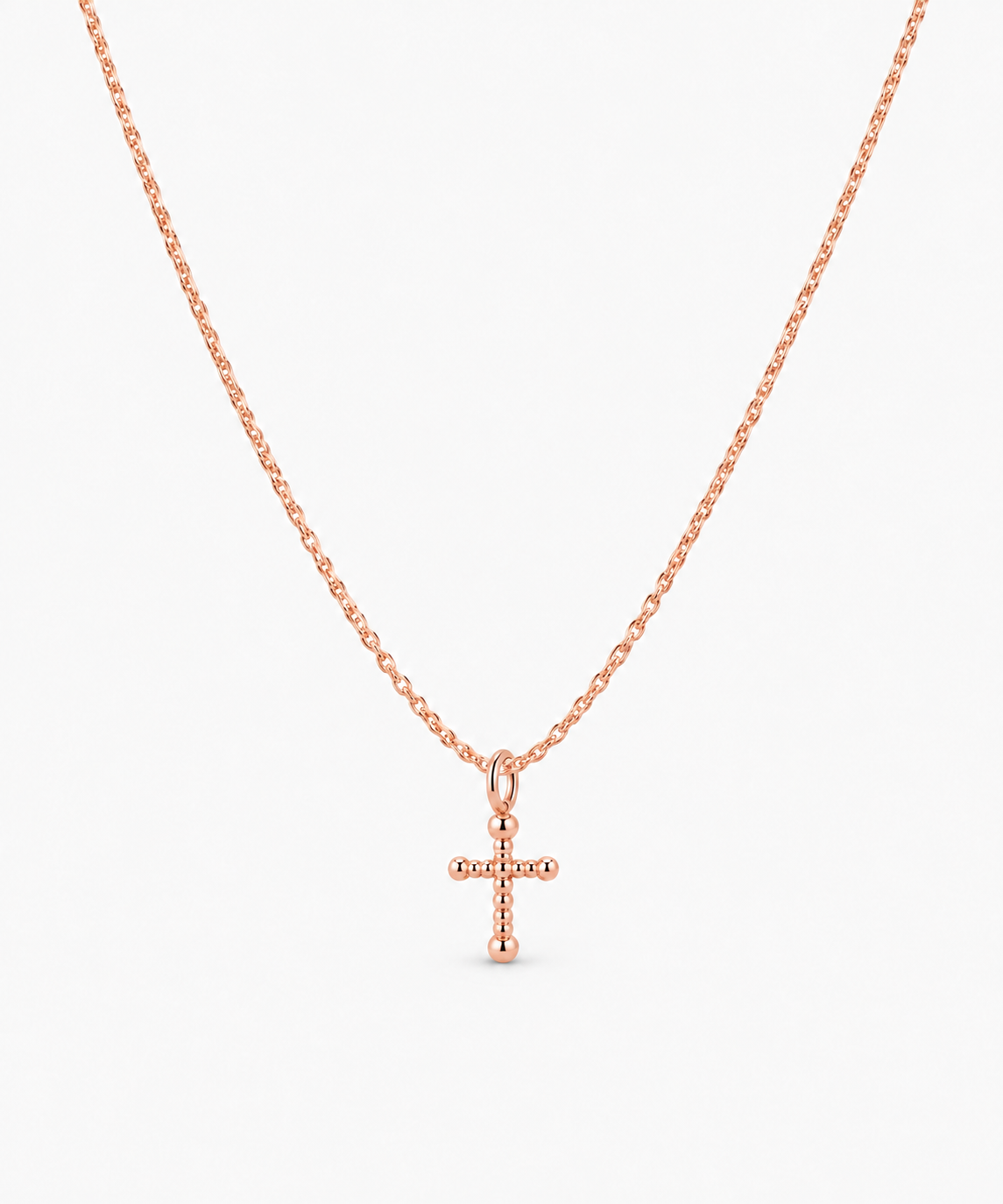 Elysia Cross Necklace in rose gold on white background