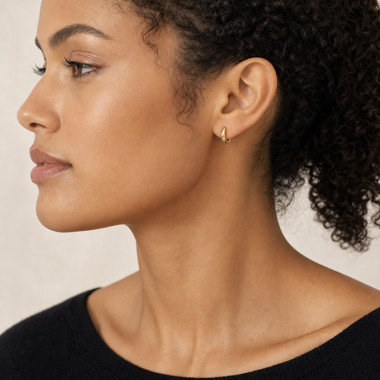 Vela Domed Huggie Earrings model 03 by SURI