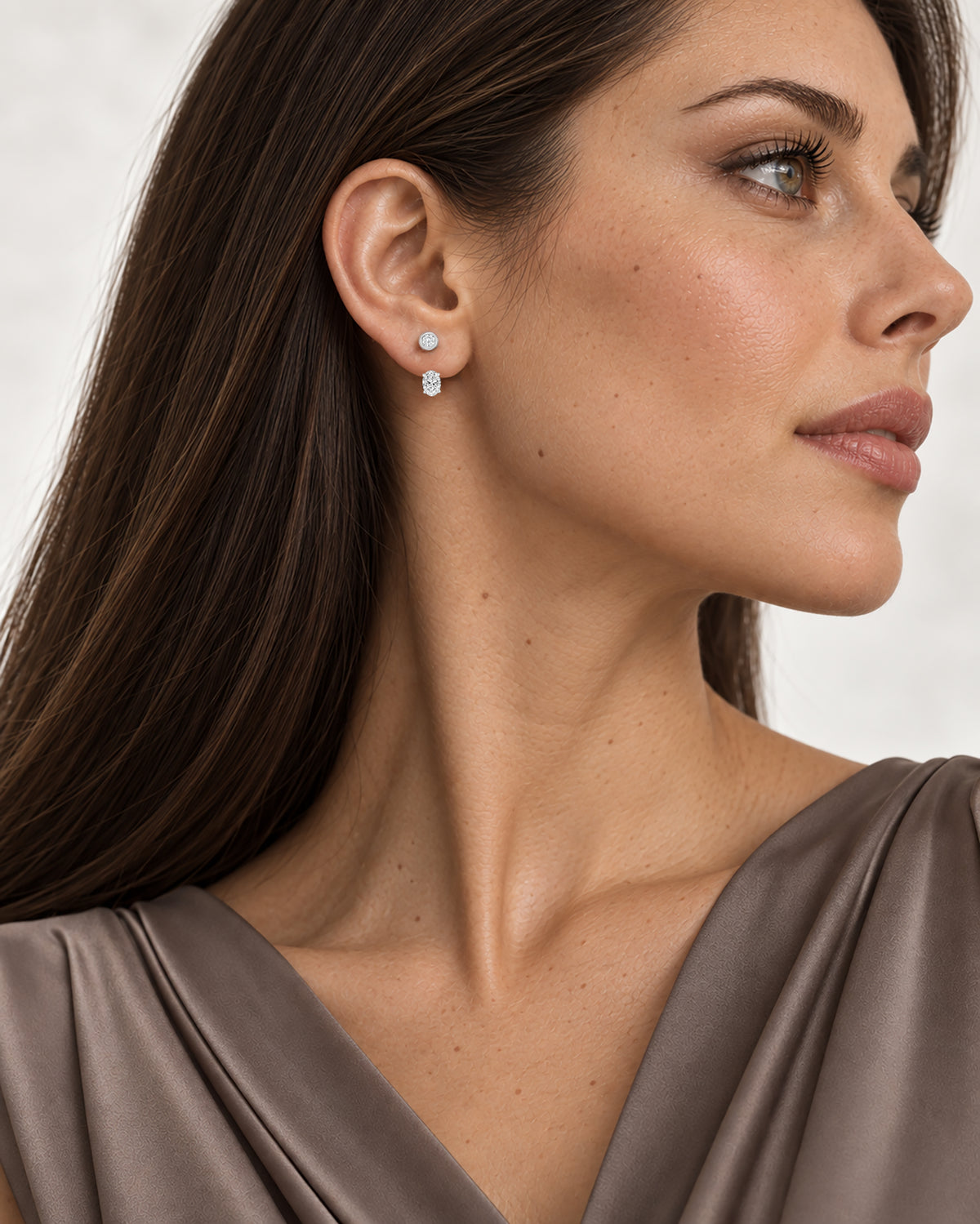 Vivienne Oval-Cut Jacket Earrings in silver, worn on model